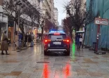 Coche de la Policía Nacional en el Paseo